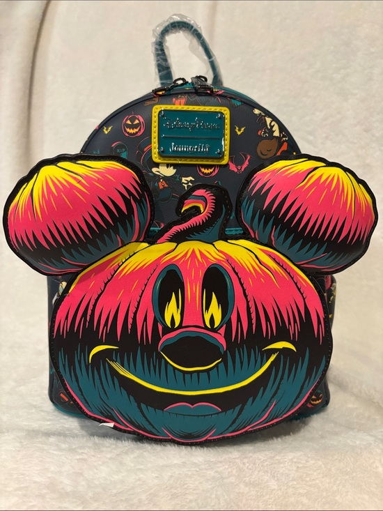 Loungefly Handbags - NWT Loungefly Disney Parks Halloween Mickey Pumpkin Glow in Dark Backpack